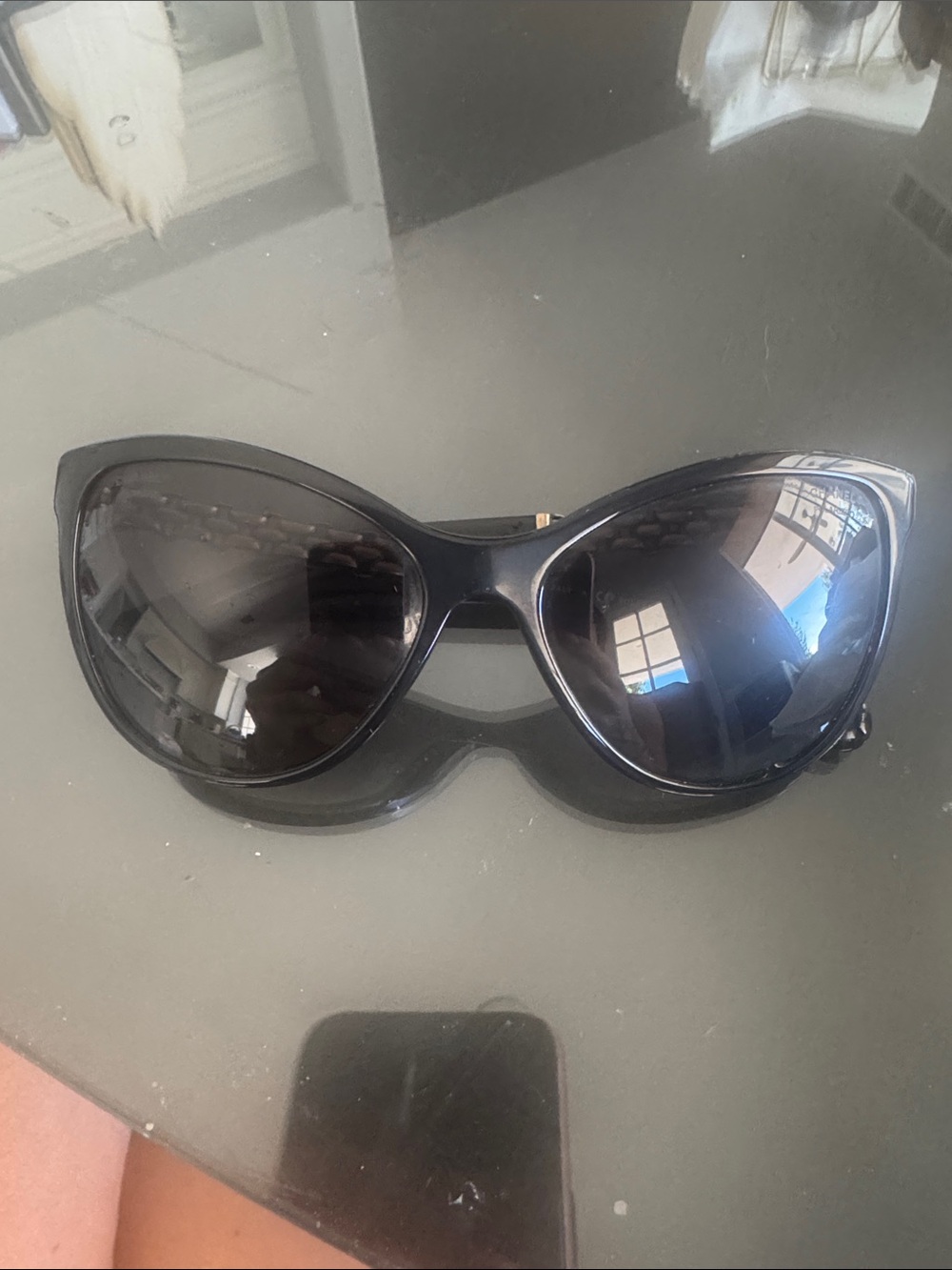 CHANEL Glossy Black Cat-Eye Sunglasses with Dark Lenses